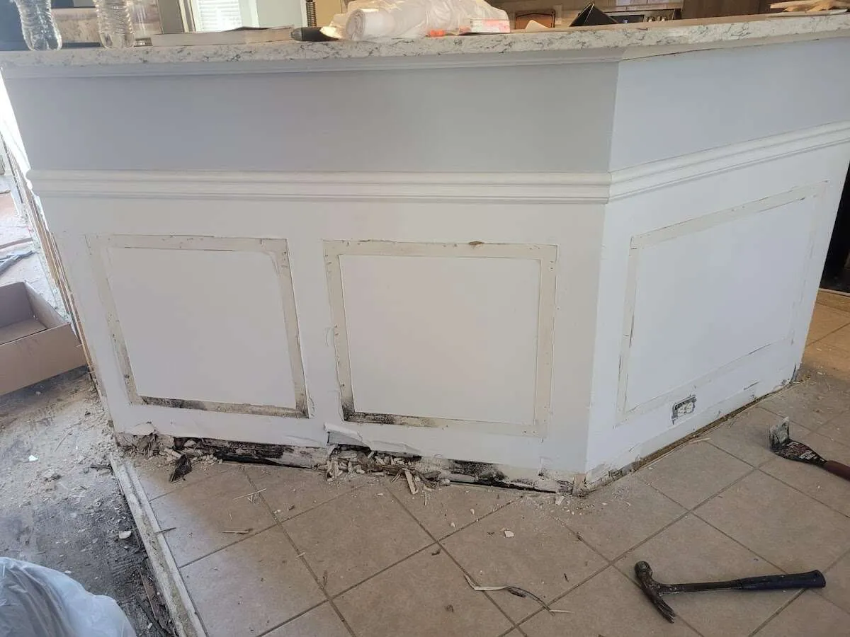 Water damage and mold on kitchen during Storm Damage Restoration in Cameron